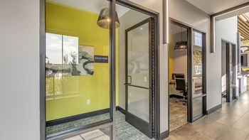 A glass door with a sign that says "FOCUS" on it.